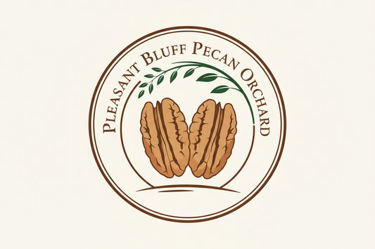 pleasant bluff pecan logo with fresh shelled pecans light brown in color